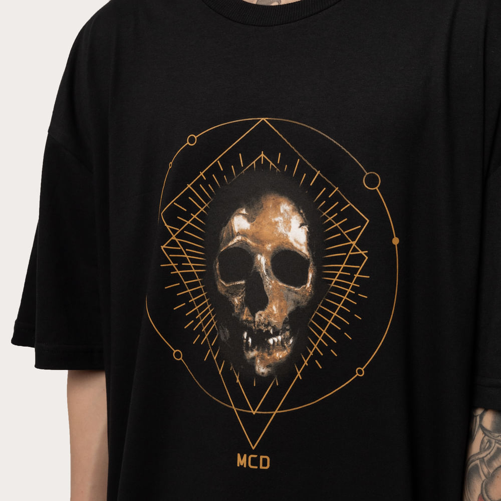 Camiseta Oversized MCD Caveira Dourada