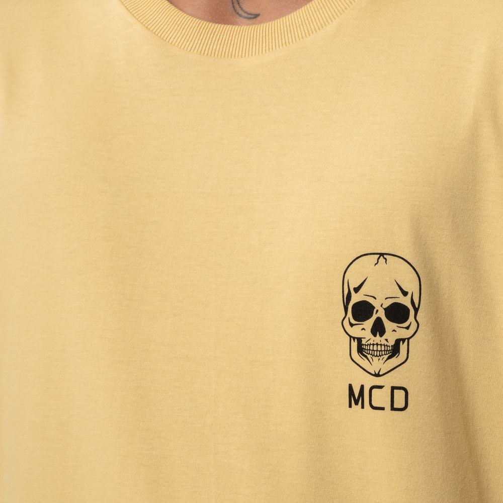Camiseta Regular MCD Logo Caveira